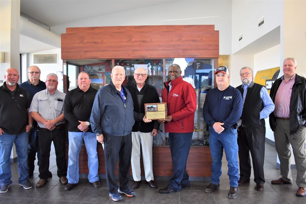 Image of Air Base Preservation Committee with plaque