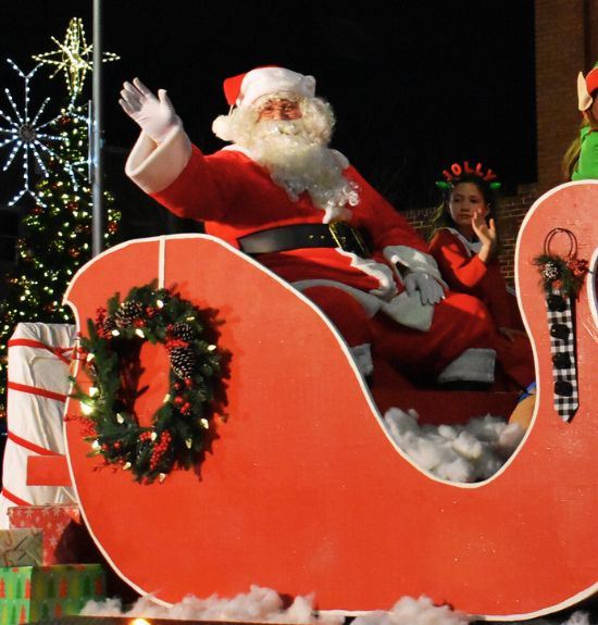 Image of Santa in a sleigh during a parade